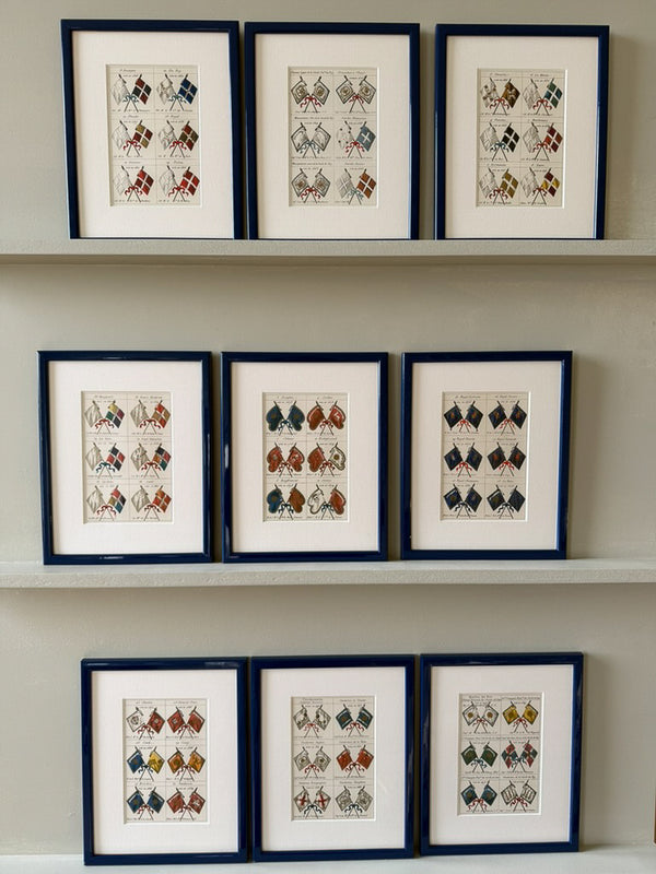Fifteen French heraldic flags framed in royal blue