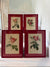 Four Redoute roses in red frames