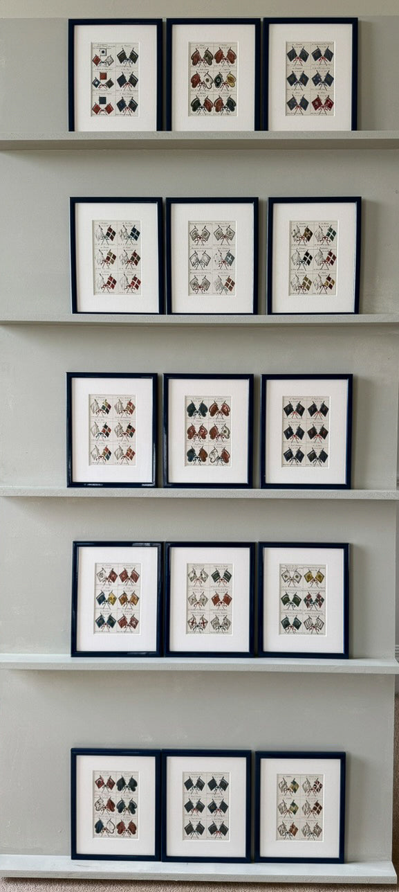Fifteen French heraldic flags framed in royal blue