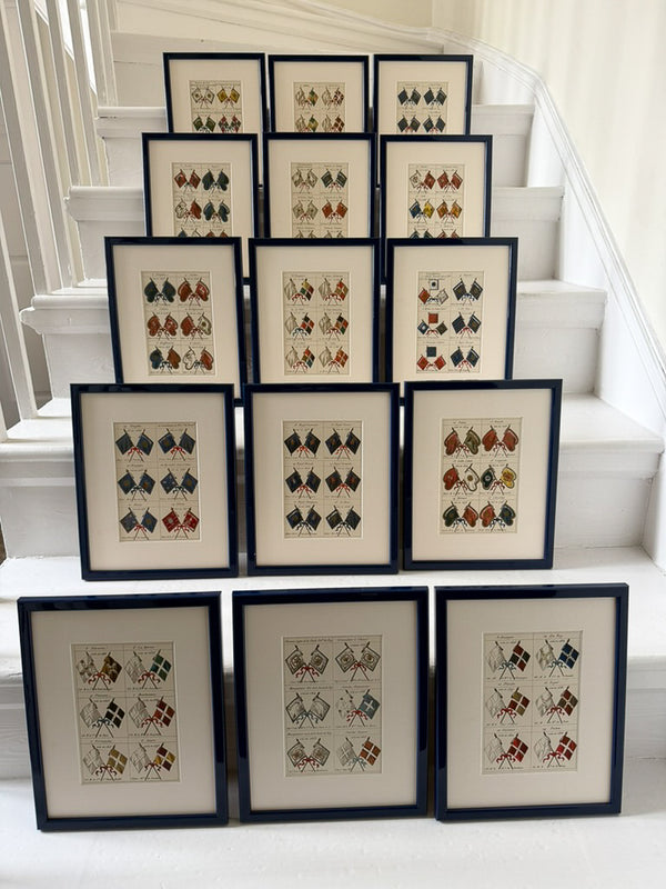 Fifteen French heraldic flags framed in royal blue