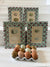 Antique egg prints in green/red art paper frames